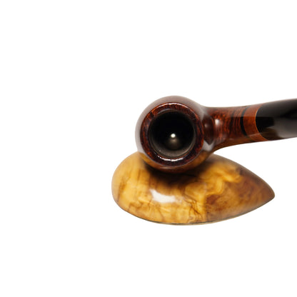 Close-up of a wooden pipe on a white background