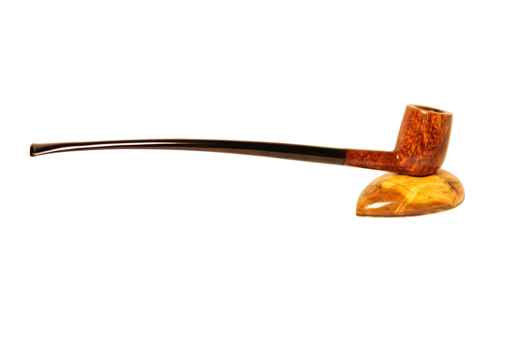 Wooden pipe on a stand with a plain background