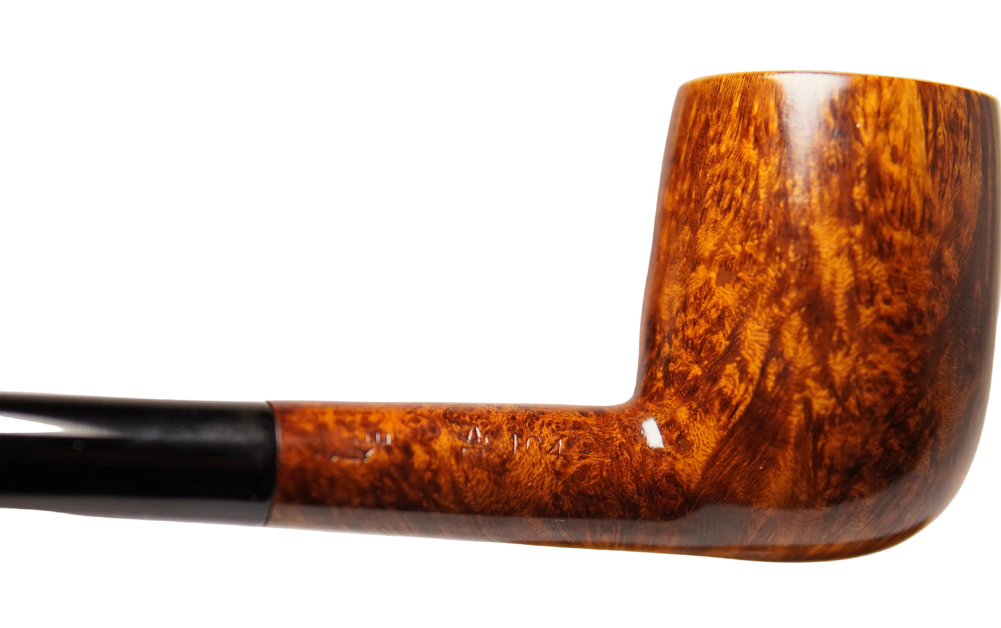 Wooden pipe with a black accent on a white background