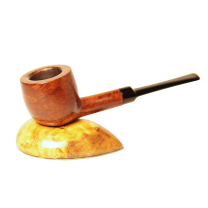Wooden pipe on a wooden stand with a white background