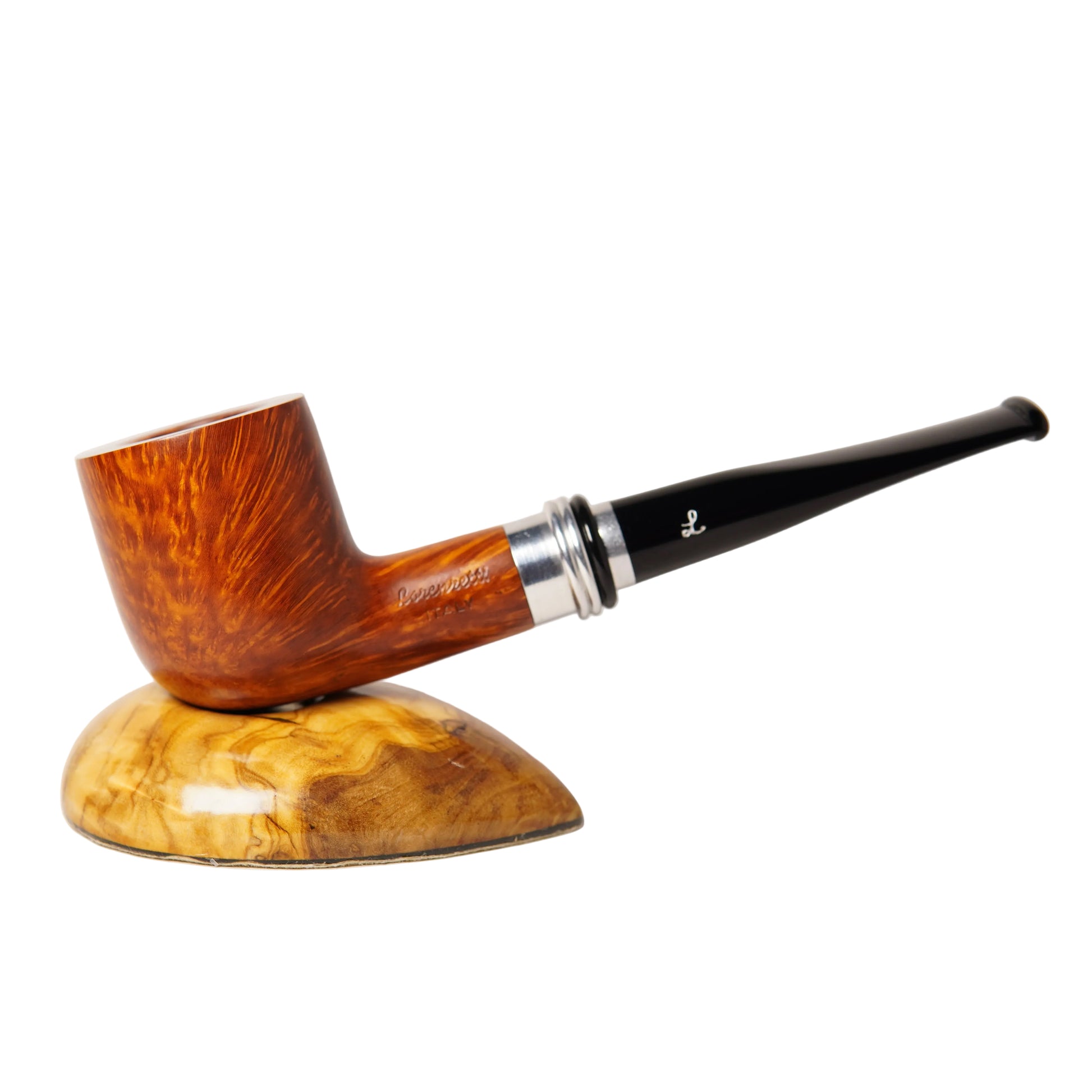 Wooden smoking pipe with black stem on a wooden stand against a white background