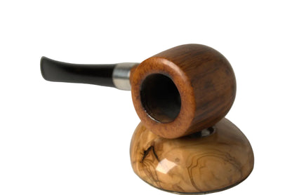 A handcrafted wooden smoking pipe with a polished brown bowl and a matching carved wooden base, set against a neutral light gray background.