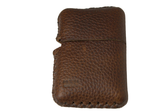 A small brown textured leather case with a stitched edge, photographed against a plain light gray background.