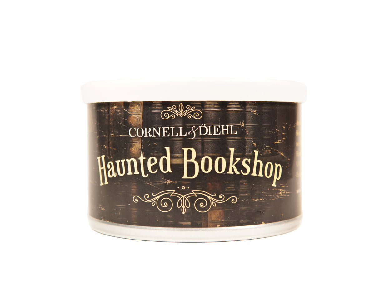 A cylindrical jar with a white lid and a dark brown label featuring the text 'CORNELL & DIEHL' and 'Haunted Bookshop' in gold lettering, set against a plain white background.