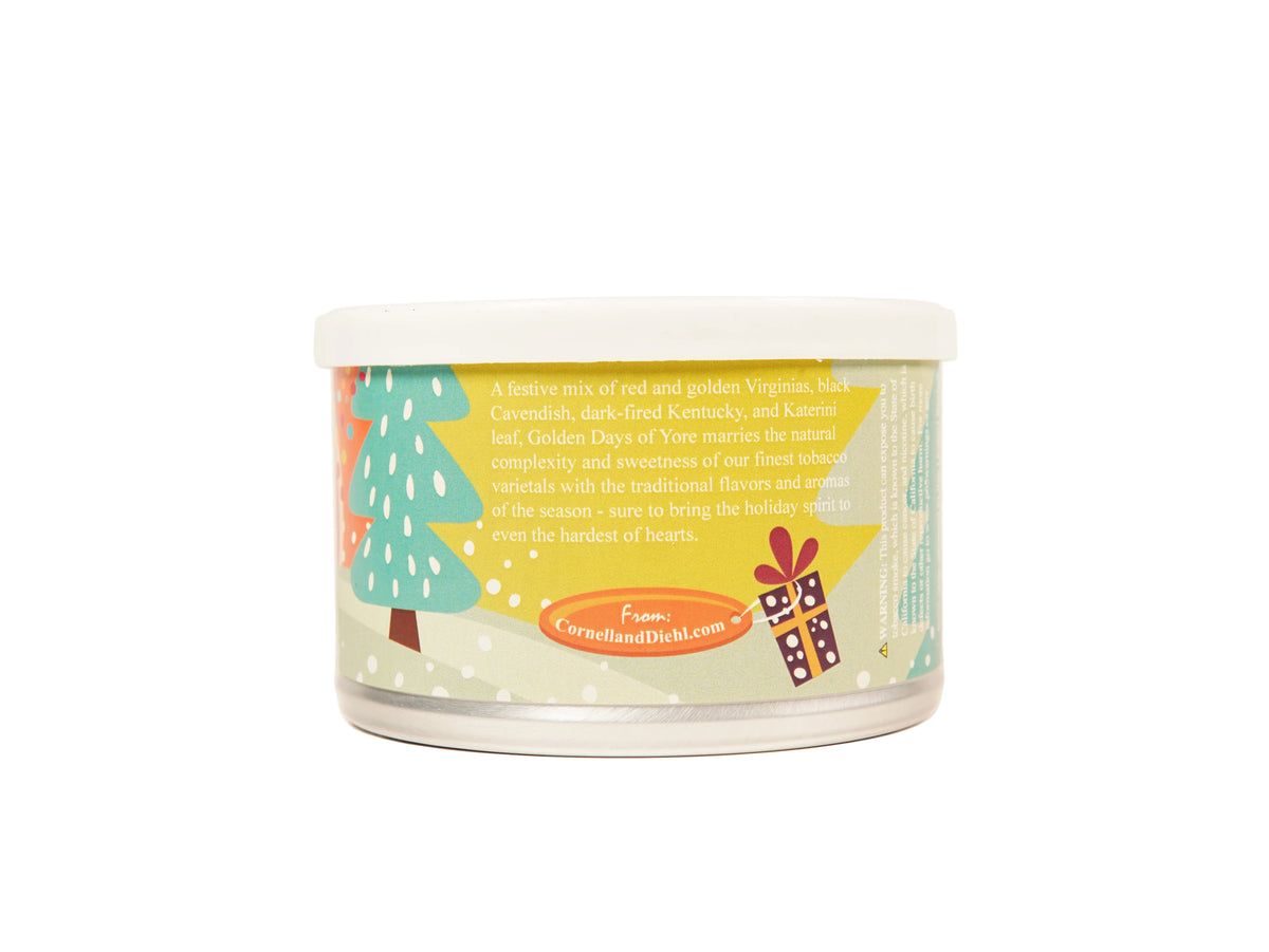 A clear plastic jar candle with a white lid and a colorful holiday-themed label, photographed against a plain white background.
