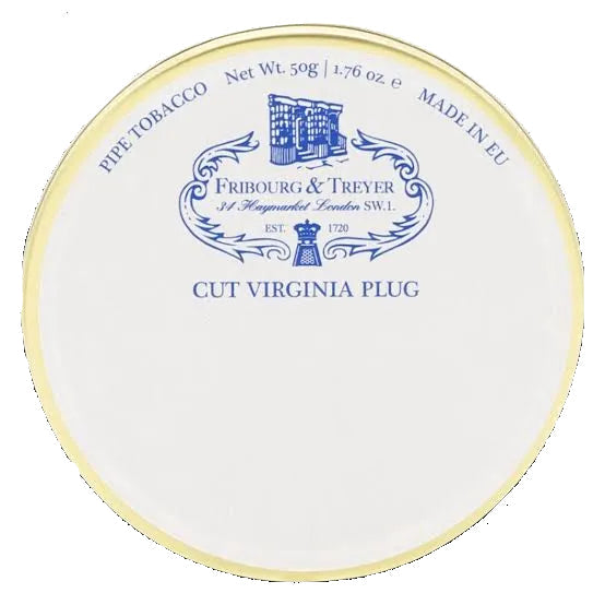 A circular white pipe tobacco tin lid or label with blue printed branding and text reading 'Fribourg & Treyer', 'Pipe Tobacco', 'Cut Virginia Plug', and 'Made in EU', shown on a black background.